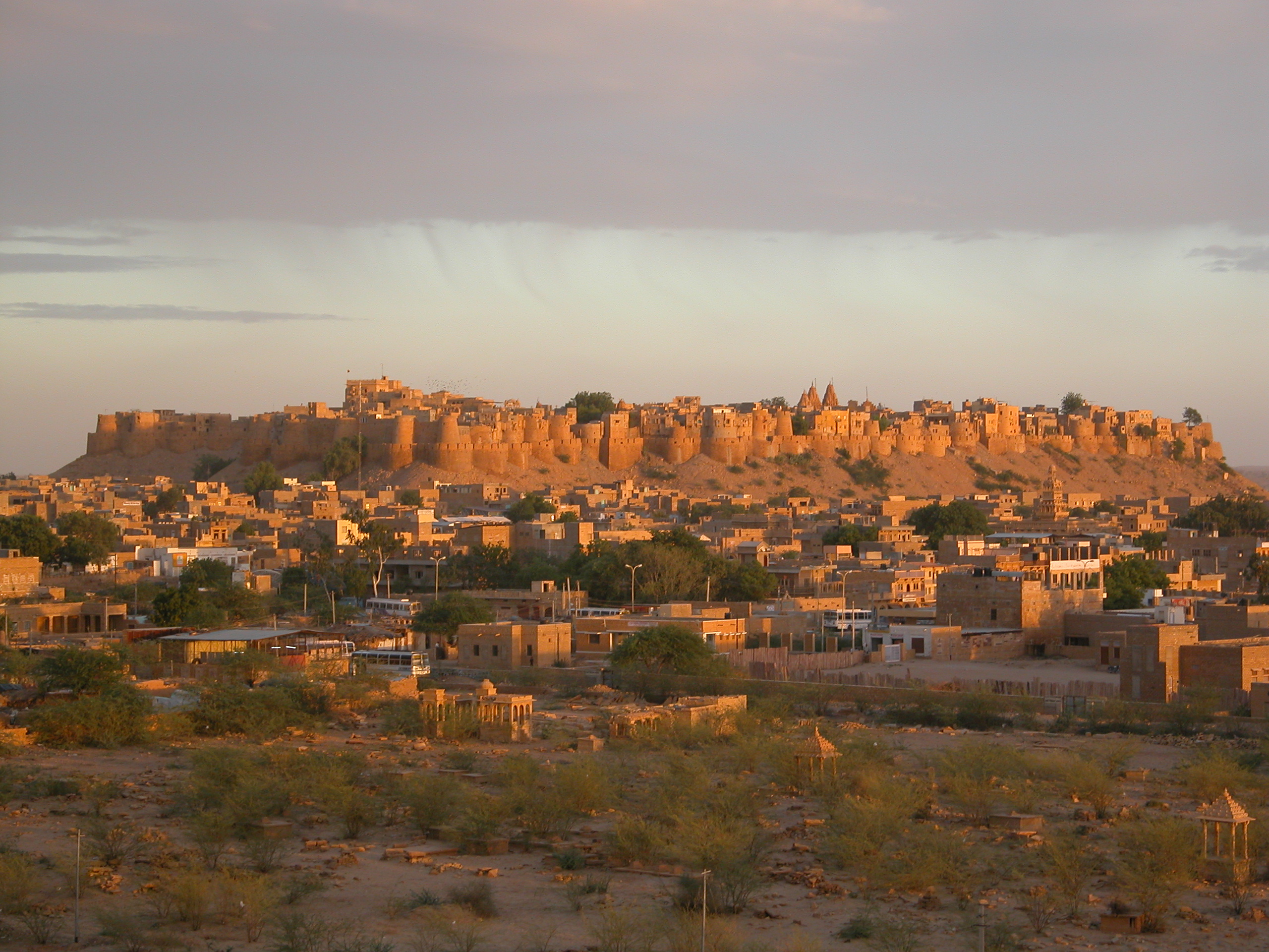 Panoramic sunset over Jaisalmer Fort rising above the Golden City